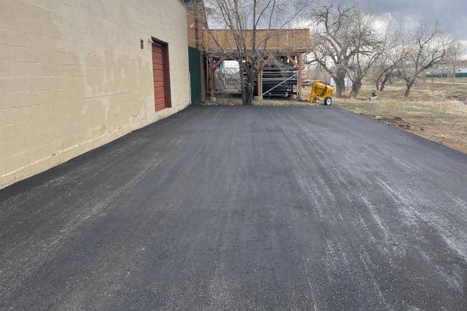 new asphalt installed in a parking lot